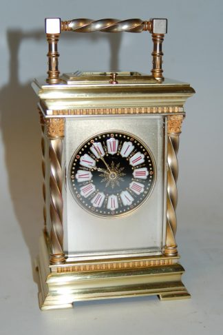 Ornate dial carriage clock