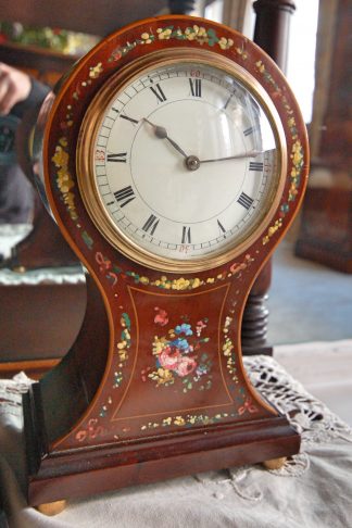 decorated French mahogany balloon clock